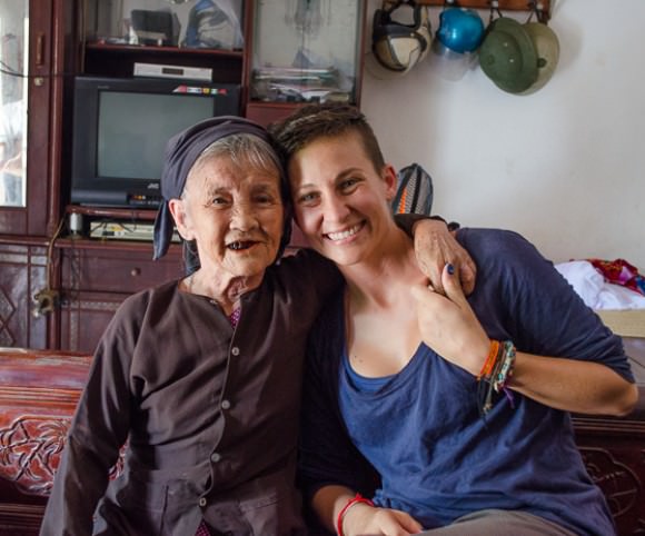 Ashlie and a elderly woman in a Vietnamese village outside of Hanoi.